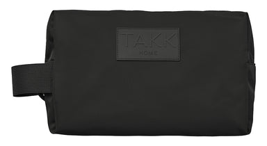 Modern, lightweight and eco-friendly unisex cosmetic bag. Ideal to store your beauty essentials for a weekend away or daily to the gym. It is generously sized, robust and yet flexible enough to store inside a carry on or a weekender. Made of recycled polyester from post-consumer waste. Black