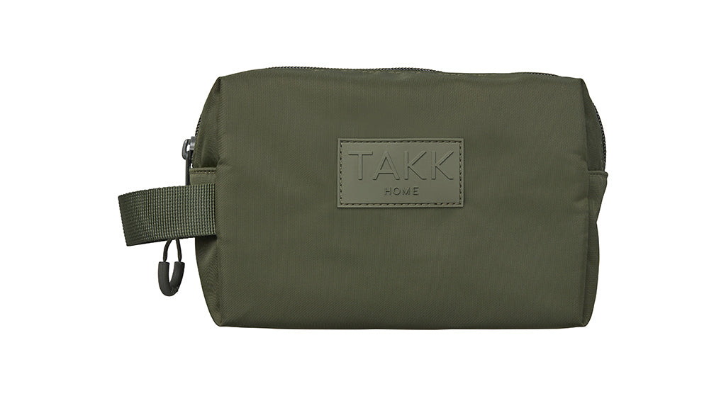 Modern, lightweight and eco-friendly make up bag. Ideal to store your everyday make up and beauty essentials. It is a perfect size for slipping into your everyday tote or bag. Recycled polyester. YKK zippers. Green